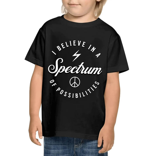 Child wearing the black I Believe In A Spectrum Of Possibilities kids cotton t-shirt